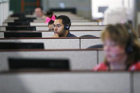 Specialists help callers with health insurance, at a call center in Providence, Rhode Island
