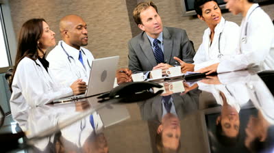 stock-footage-financial-advisor-meeting-medial-team-executives-in-hospital-boardroom