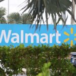 Wal-Mart merges tech teams in online push
