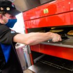 Domino’s To Hire 20K Amid Surge In Pizza Demand